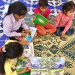 Global Hand Charity Children Reading Donated Books